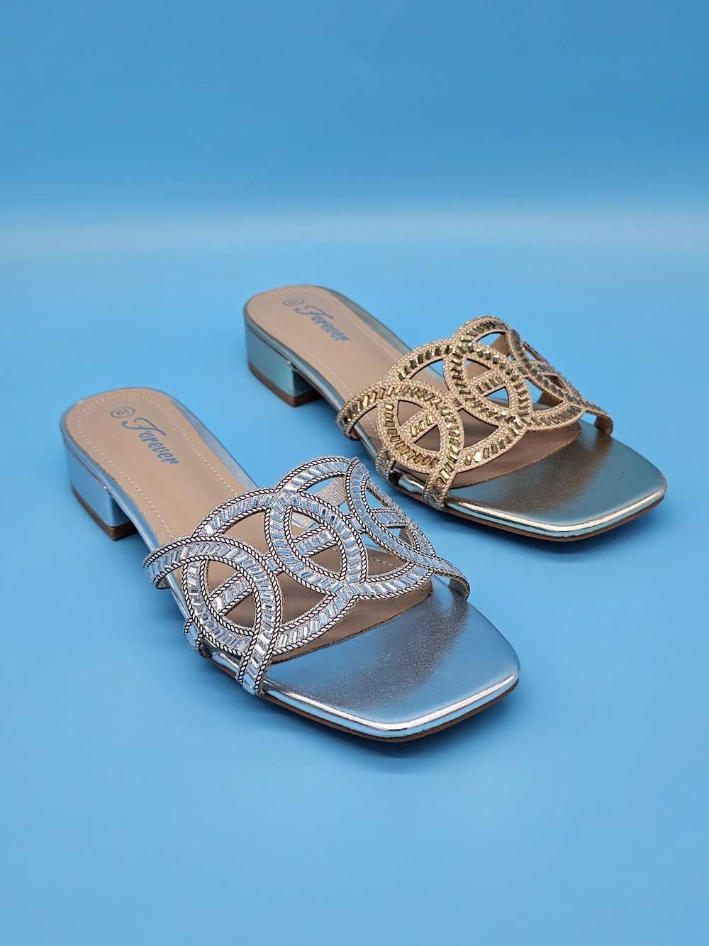 Forever Link Metallic Slide Mules in Silver and Gold
